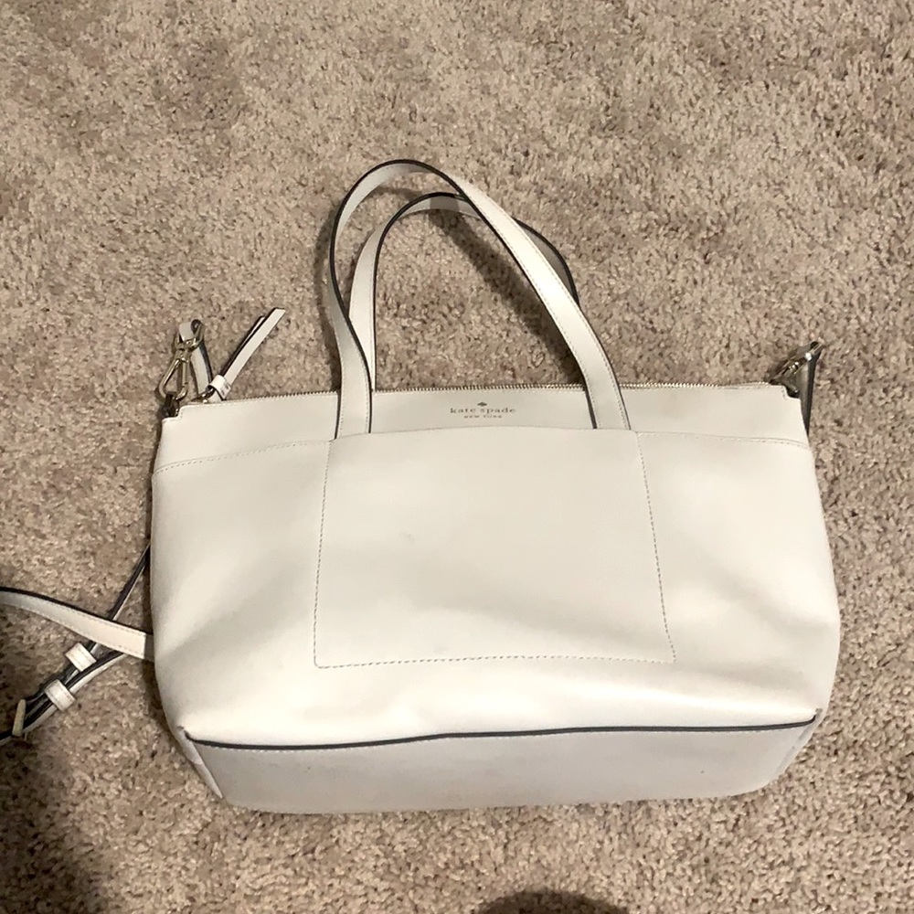 White Kate Spade purse with powder blue interior